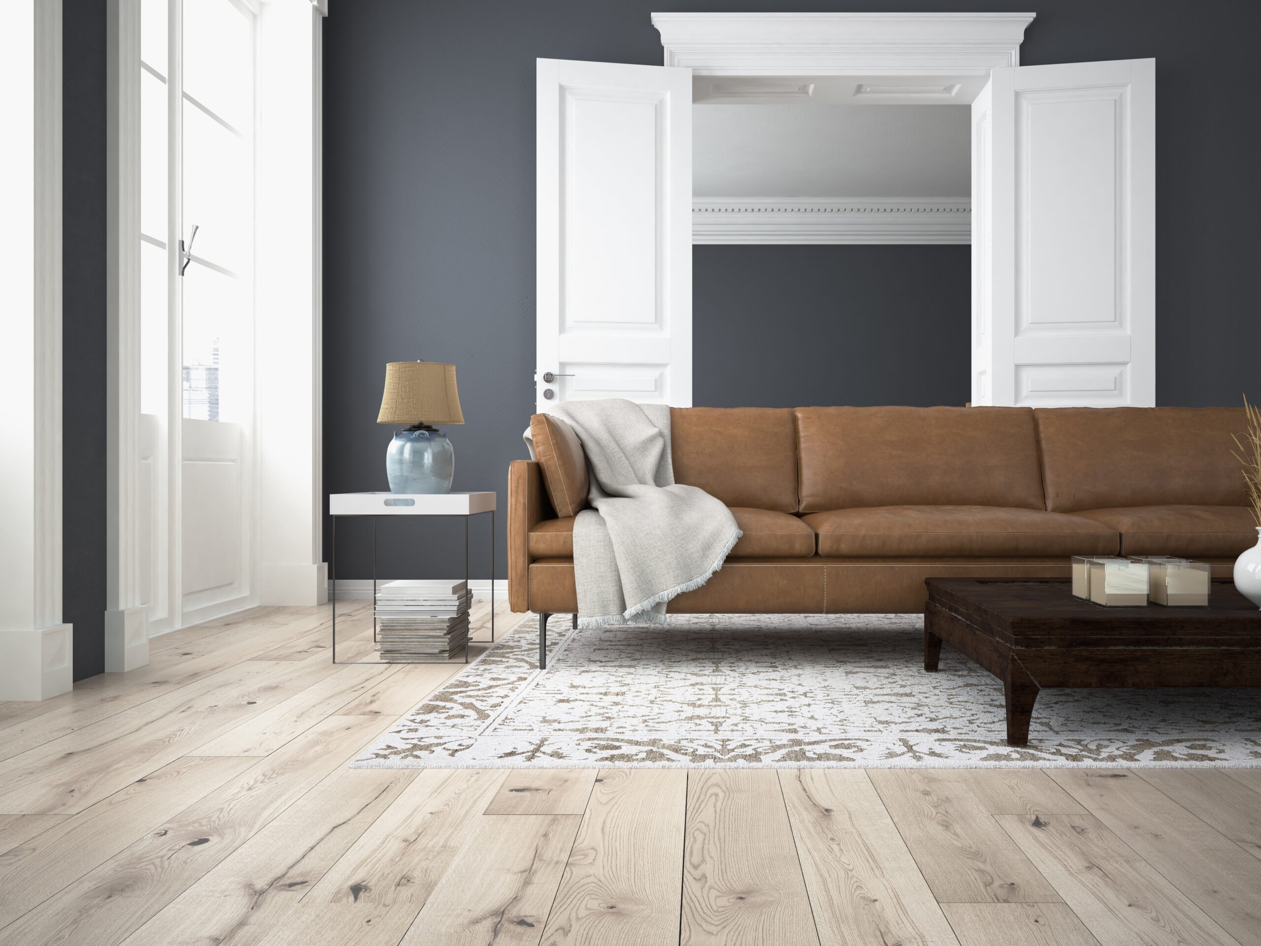 Room With Brown Couch And Light Wood Flooring Scaled 