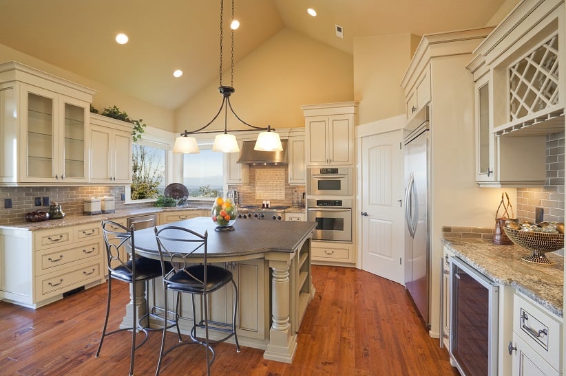 white kitchen with hardwood floors