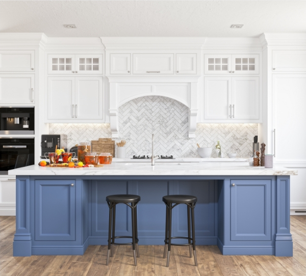 Kitchen with blue and white cabinets and wood floors