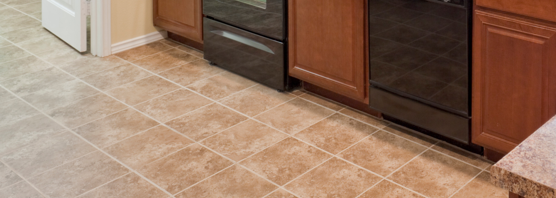 Up-close photo of tile flooring in kitchen