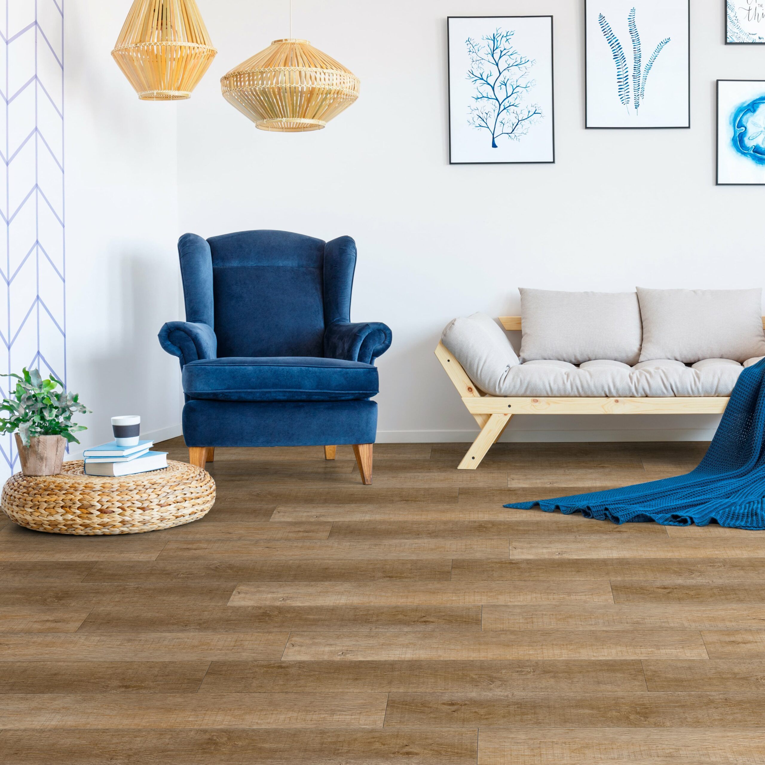 vinyl spc flooring in room with tan couch and blue chair