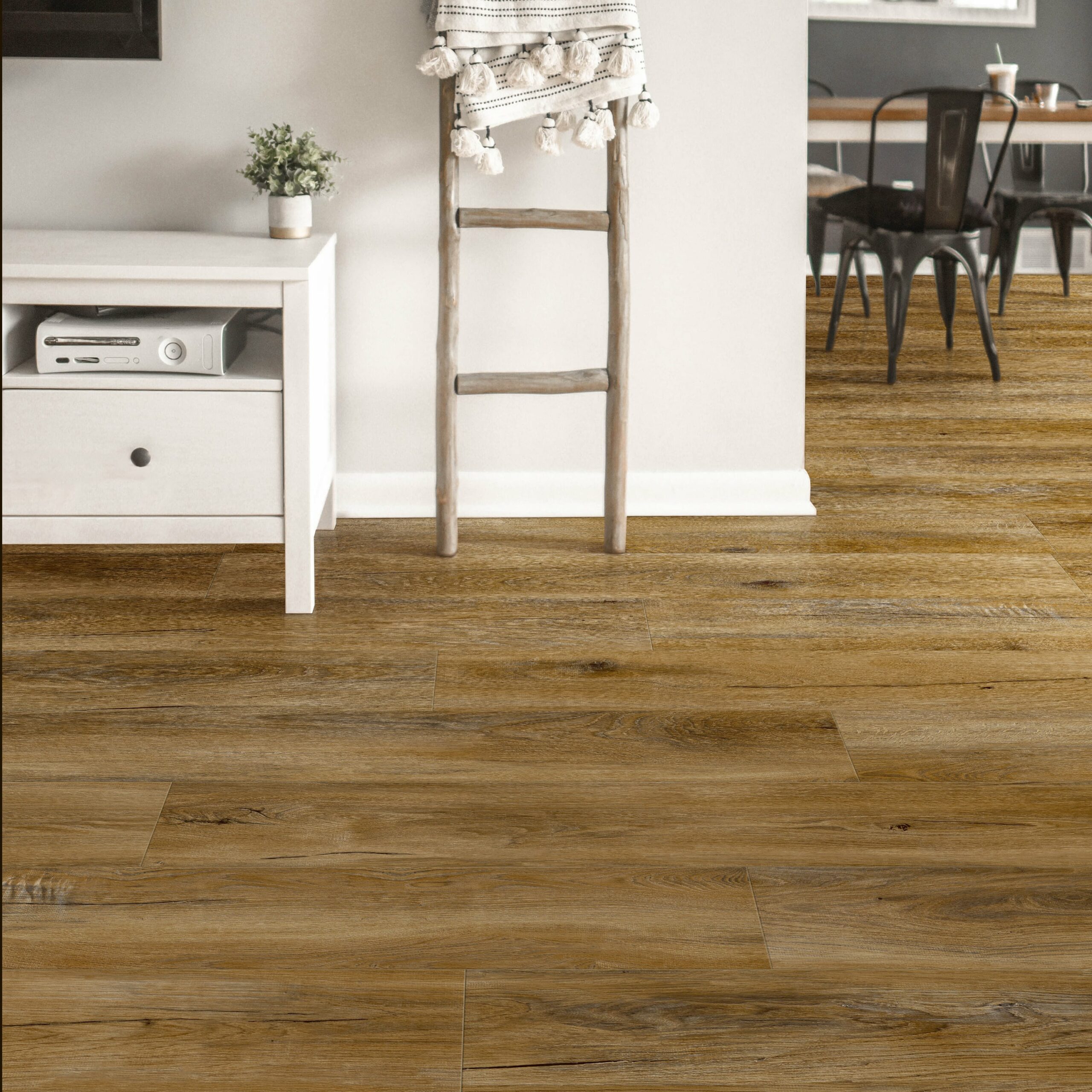 brown spc flooring in room with tv console and ladder decor