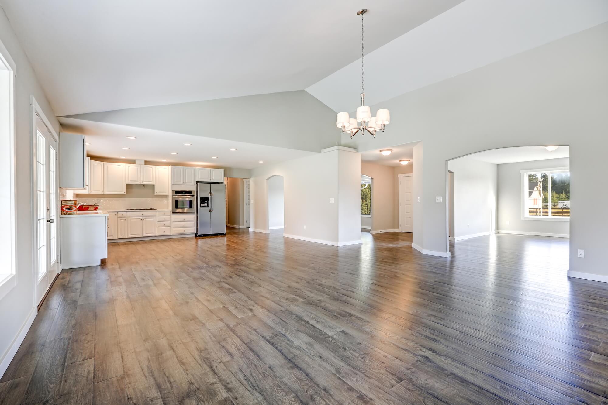 distressed wood floor in living room and kitchen