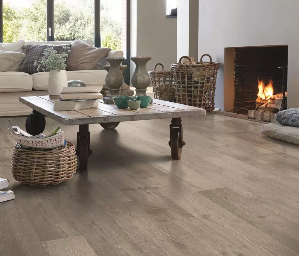 laminate in living room in front of fireplace