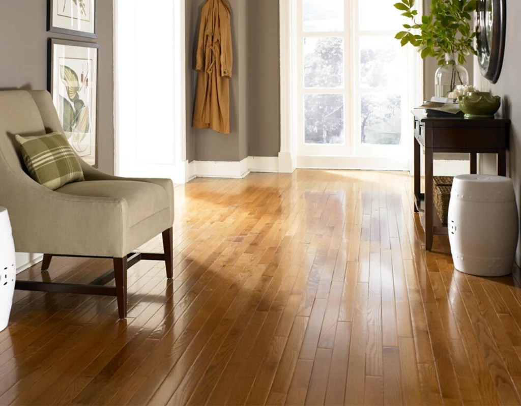 Torrey Pines: Stirrup Hardwood Floor in Room with Chair and Table